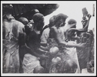 8 males in bodycloths dancing and holding a rattle with umbrella in left background