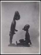 2 figurines: 1 standing and 1 seated