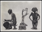 2 figurines performing various tasks and an animal