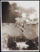 1 male playing 2 drums