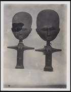 2 female figurines stylised with enlarged heads