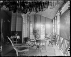 Verandah of London Missionary Society Misssion House with table and chairs