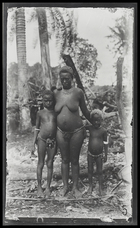 A woman and two children standing next to each other; full face, on Kulumbangra, a large volcanic island near Gizo.
