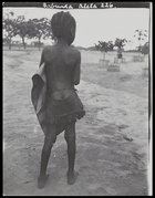 young boy with his back to the camera