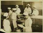 Photograph of women working at a London communal kitchen