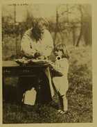 Photograph of a woman feeding seaweed jelly to a child