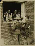 Photograph of English cadets drawing their bread ration