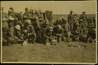 Postcard of soldiers receiving rations