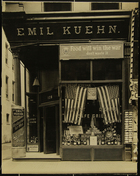 Photograph of 'Food will win the war' billboard outside of Emil Kuehn cafe, Chicago, IL, 1918