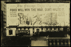 Photograph of 'Food will win the war, don't waste it' billboard, Chicago Tribune building, Chicago, IL