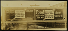 Photograph of 'Food will win the war don't waste it' billboard, Chicago, IL