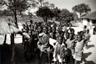 Black & White Photograph of Group of Smiling Children